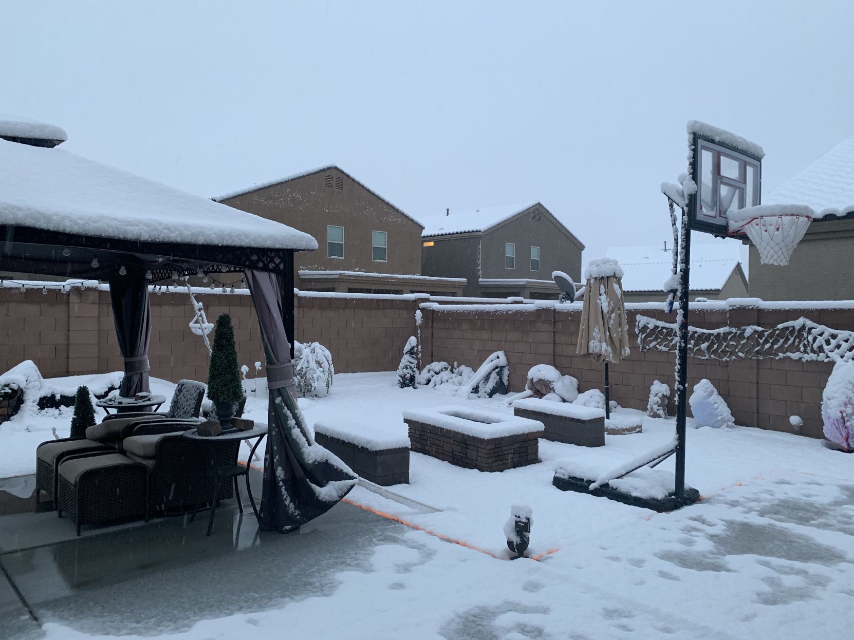 Snow on our Basketball Ring!